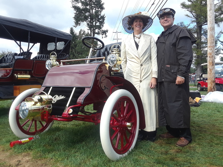 Woman and Man with 1920s Car